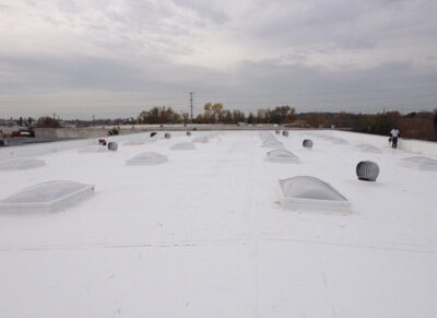 Residential asphalt roof being repaired