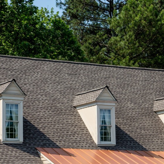 TPO roofing being installed on building